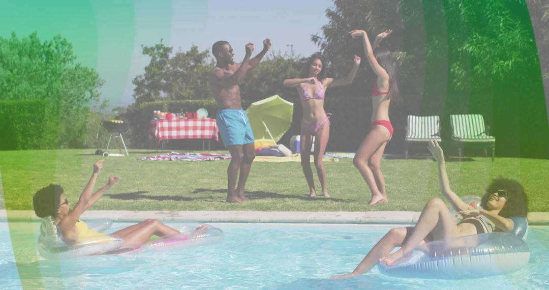 Energetic Friends Dancing Freely at Poolside Get-Together