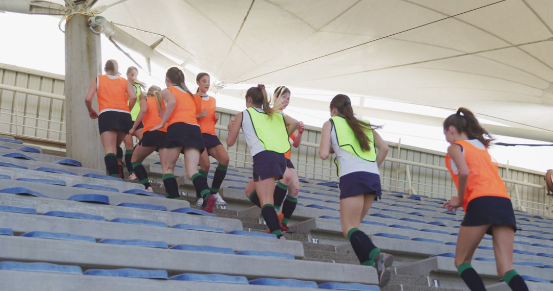 Female Athletes Training on Bleachers in Stadium - Free Images, Stock Photos and Pictures on Pikwizard.com