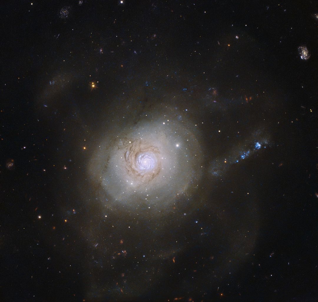 Spiral Galaxy NGC 7252 with Atomic-like Loops, Hubble Space Telescope - Free Images, Stock Photos and Pictures on Pikwizard.com