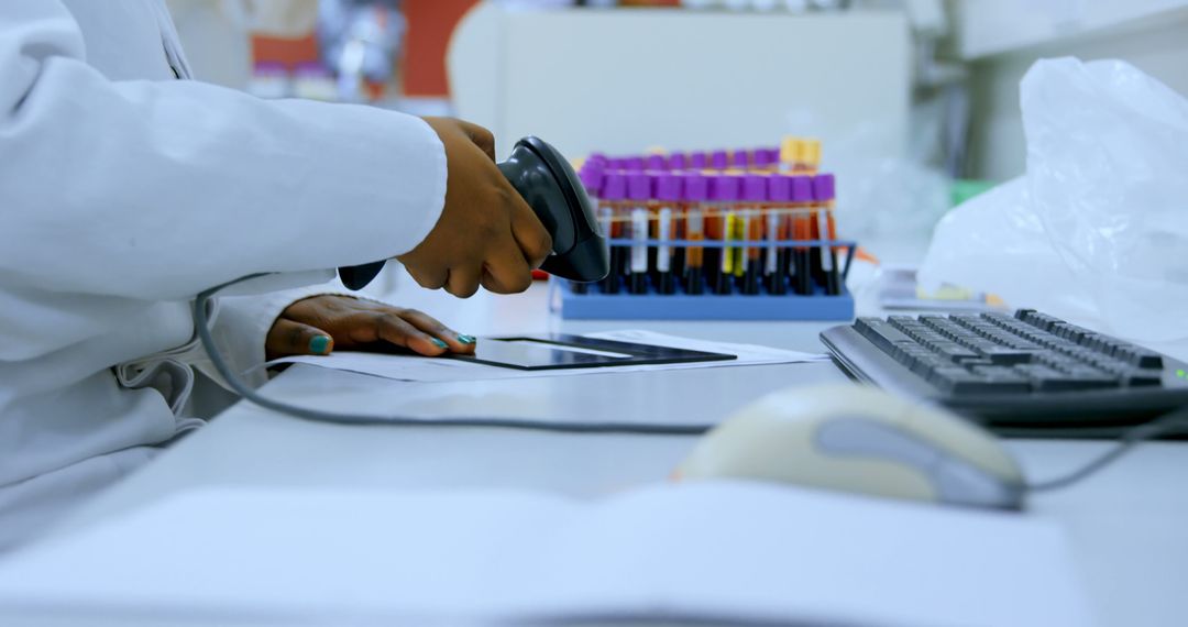 Lab Technician Scanning Barcode in Medical Laboratory - Free Images, Stock Photos and Pictures on Pikwizard.com