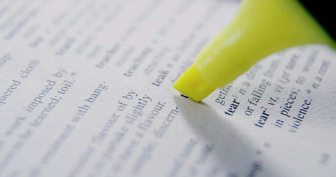 Highlighting Word 'Tear' in Dictionary with Neon Yellow Marker