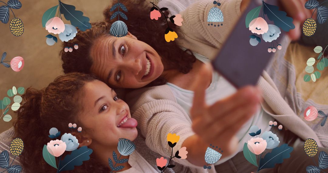 Mother and Daughter Playfully Taking Selfies with Flower Frame