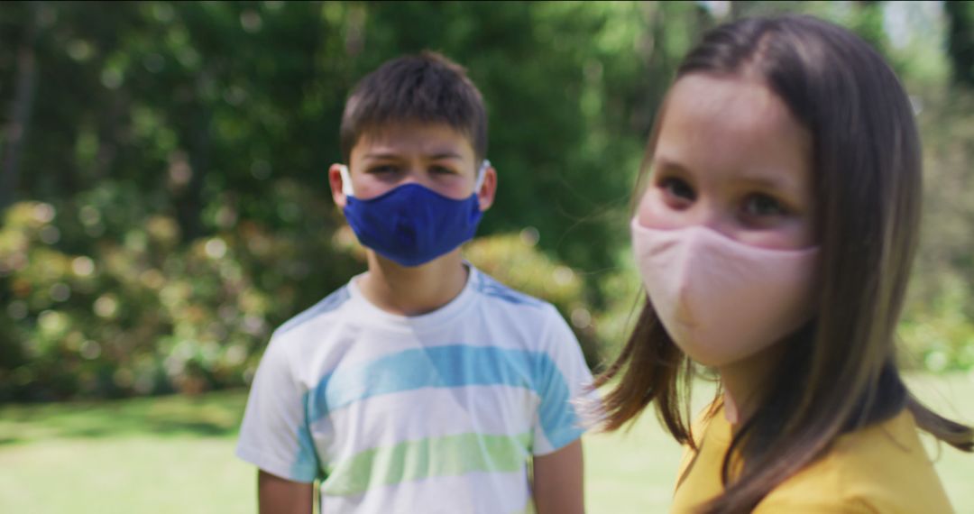 Children Wearing Masks in Outdoor Park During Daytime - Free Images, Stock Photos and Pictures on Pikwizard.com