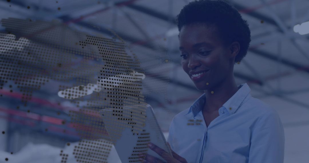 Woman Engineer Using Tablet in Smart Warehouse with Digital World Map Overlay