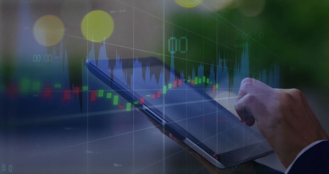 Person Analyzing Financial Data on Tablet with Digital Graphics Overlay