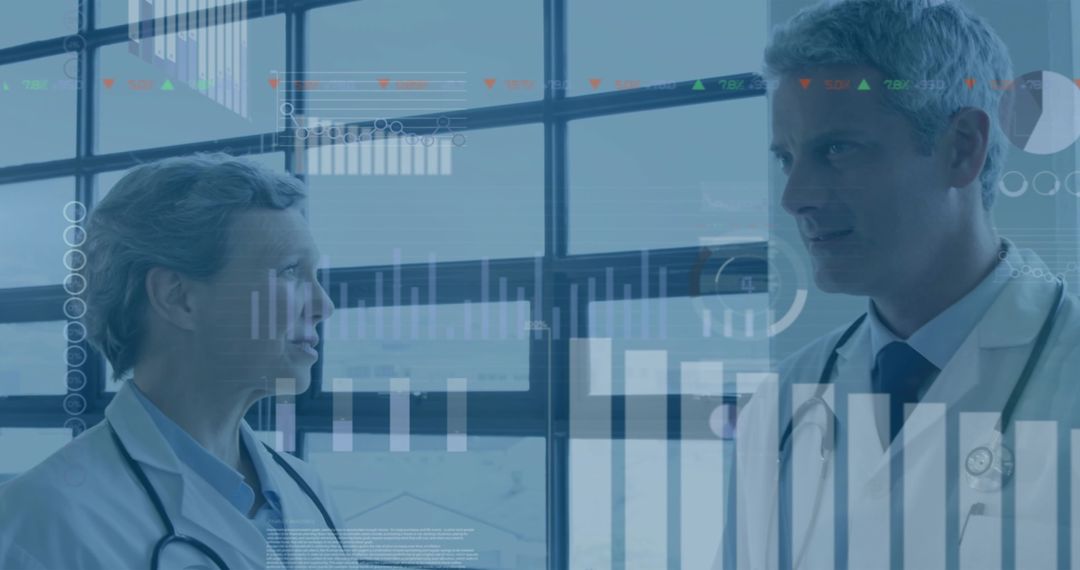 Doctors Analyzing Data with Innovative Technology in Research Lab