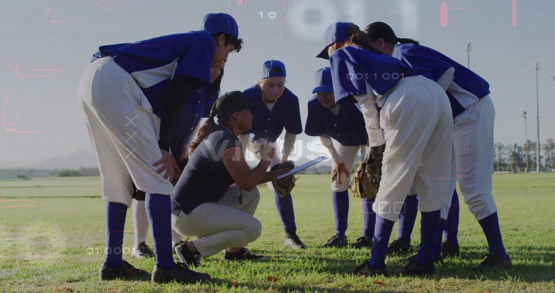 Dedicated Softball Team Huddling with Coach in Athletic Field