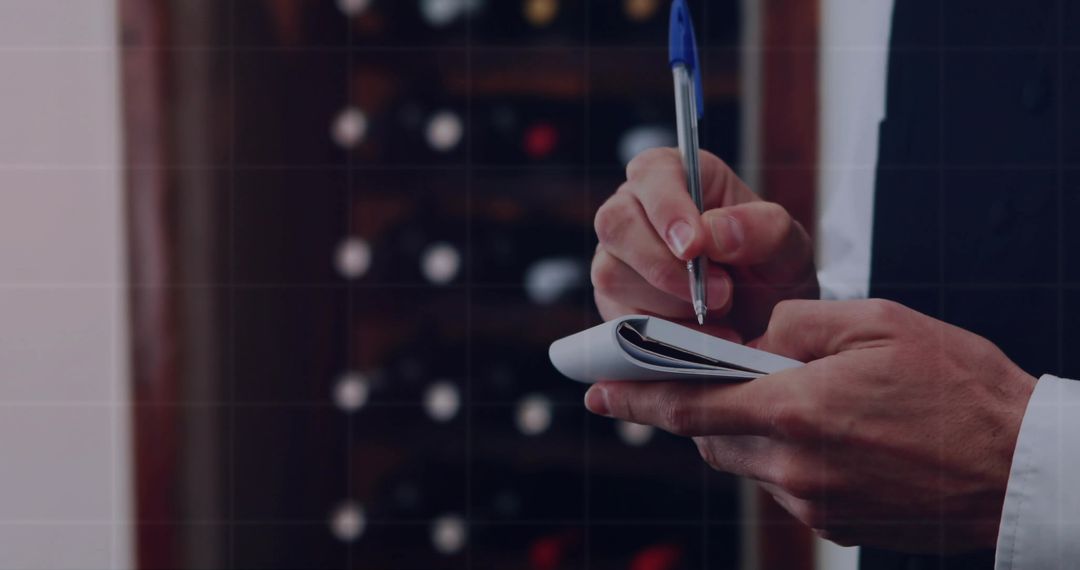 Sommelier Inventory Taking in Elegant Wine Cellar
