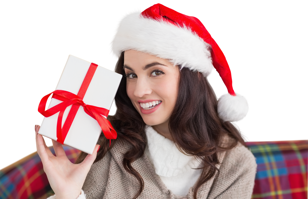 Smiling Woman Holding Christmas Gift in Santa Hat on Transparent Background - Download Free Stock Images Pikwizard.com