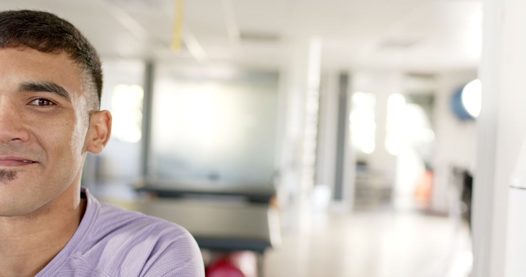 Man focusing on physical recovery in rehabilitation center