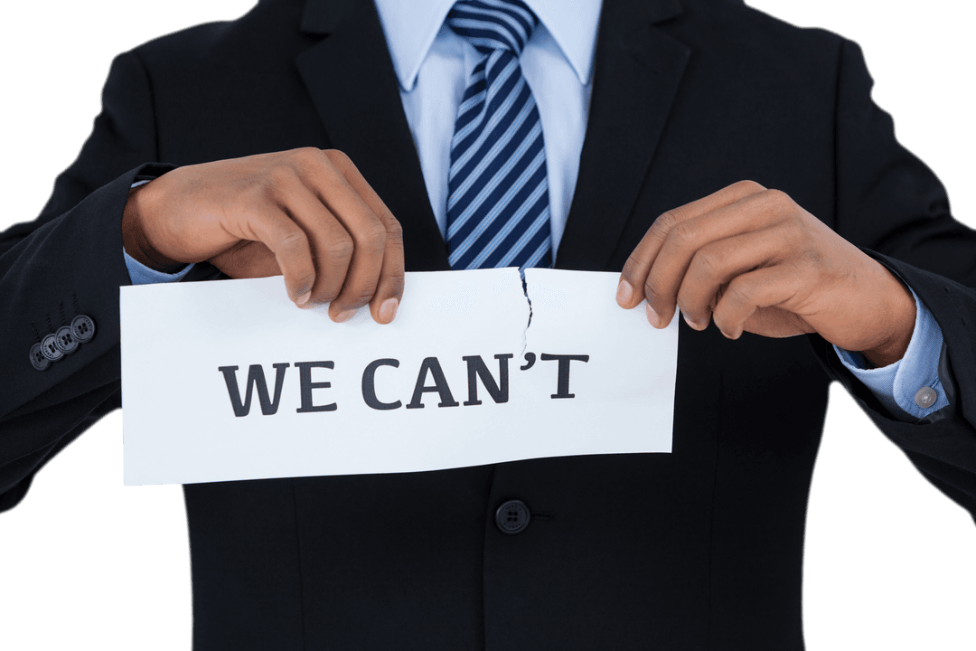 Transparent View of Determined Businessman Tearing Negative Note