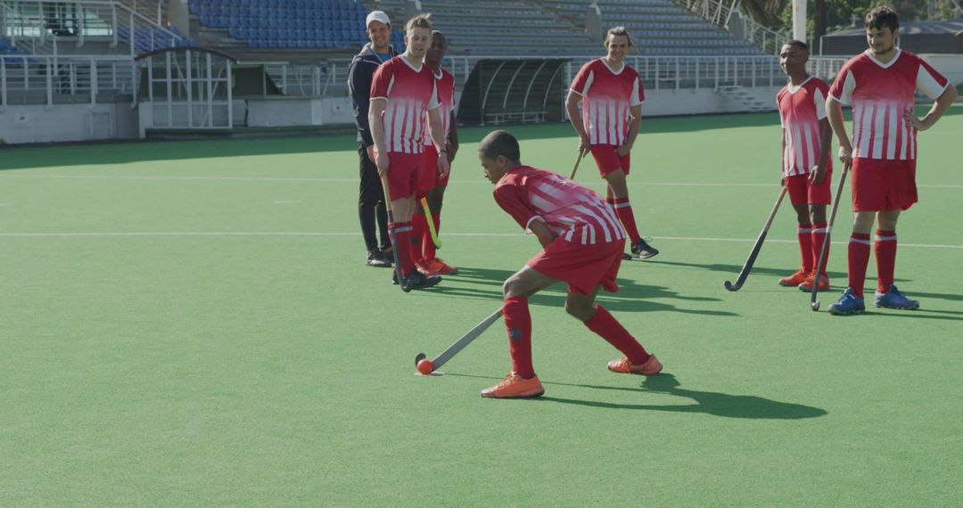 Field Hockey Team Training on Outdoor Turf - Free Images, Stock Photos and Pictures on Pikwizard.com