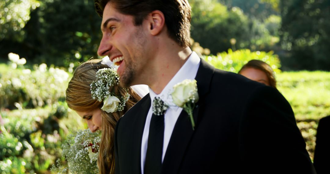 Groom Smiling with Boutonniere at Outdoor Wedding Ceremony - Free Images, Stock Photos and Pictures on Pikwizard.com