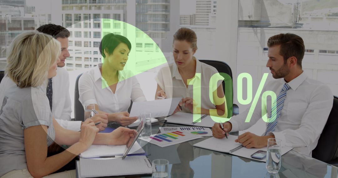 Diverse Business Team Collaborating on Financial Data with Chart Overlay