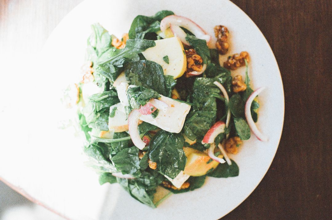 Bright Spinach Apple Salad with Walnuts, Goat Cheese, Red Onion and Vinaigrette