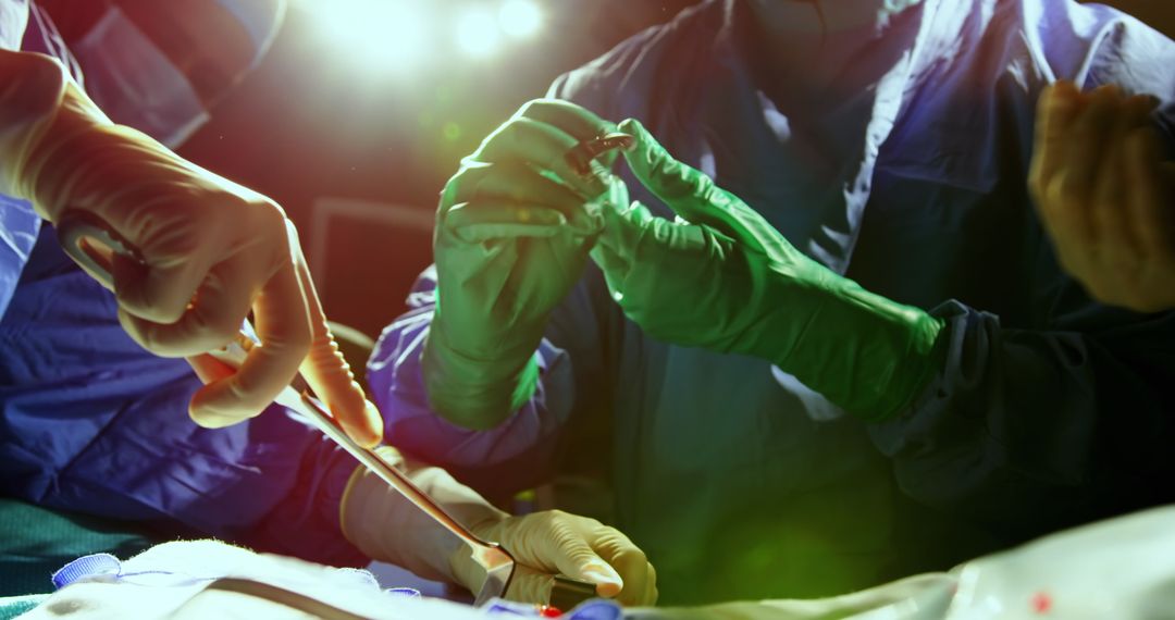 Surgeons Performing Precise Surgery in Operating Room - Free Images, Stock Photos and Pictures on Pikwizard.com