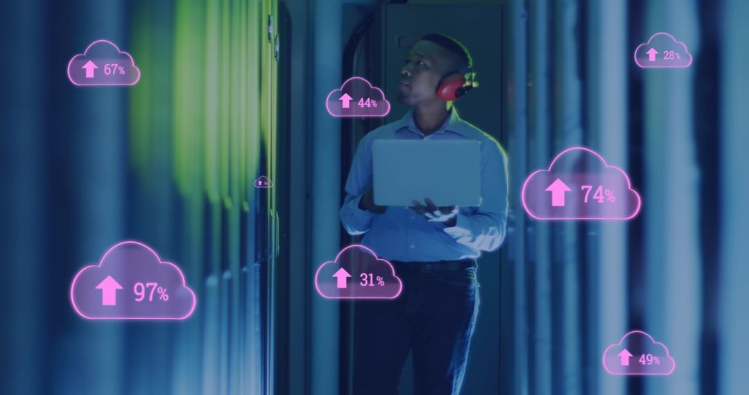 African American Technician in Server Room with Cloud Upload Icons