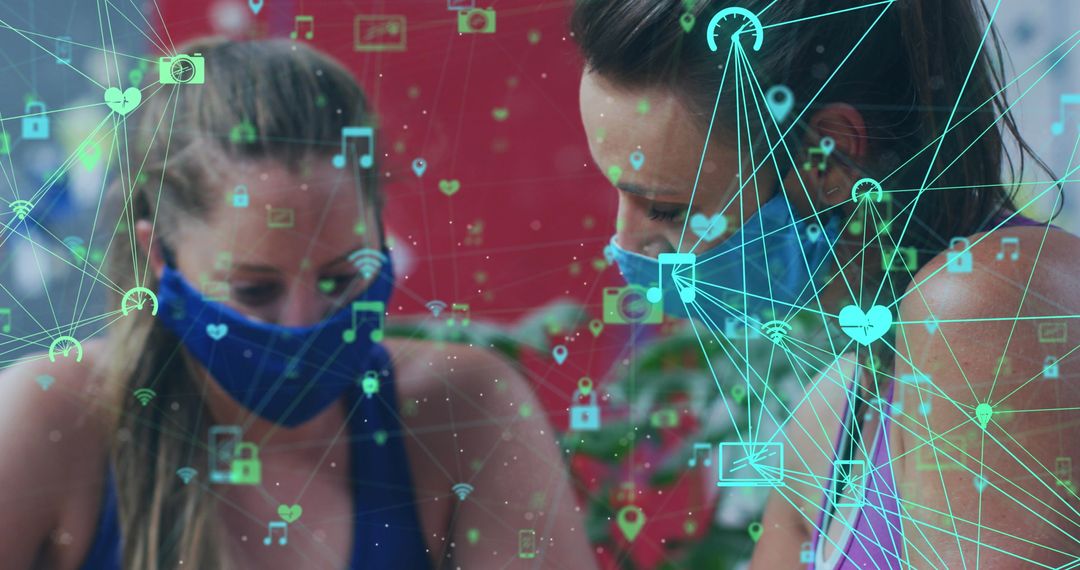 Women Discuss Digital Data Connectivity While Wearing Masks