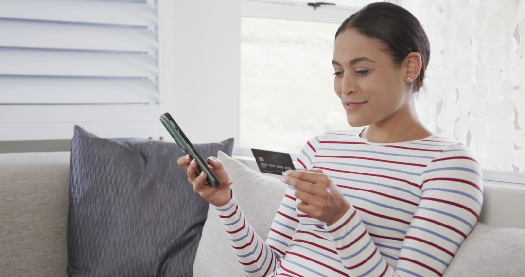 Woman Shopping Online with Credit Card and Smartphone at Home - Free Images, Stock Photos and Pictures on Pikwizard.com