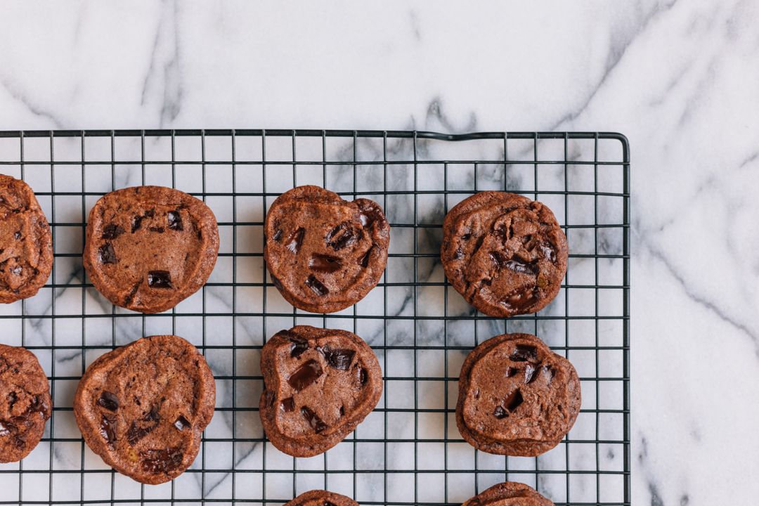 Freshly Baked Chocolate Chunk Cookies Cooling on Rack