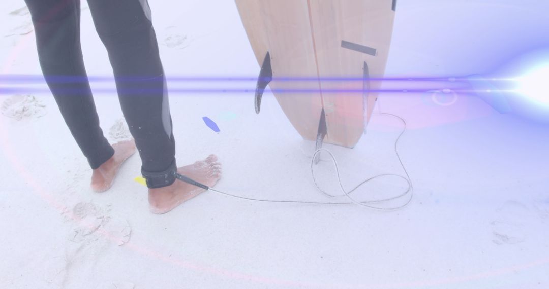 Surfer with Board on Sandy Beach in Blazing Sunlight