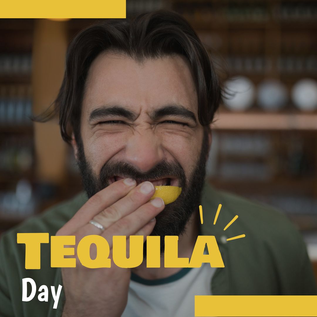 Young Man Eating Lemon at Bar Celebrating Tequila Day