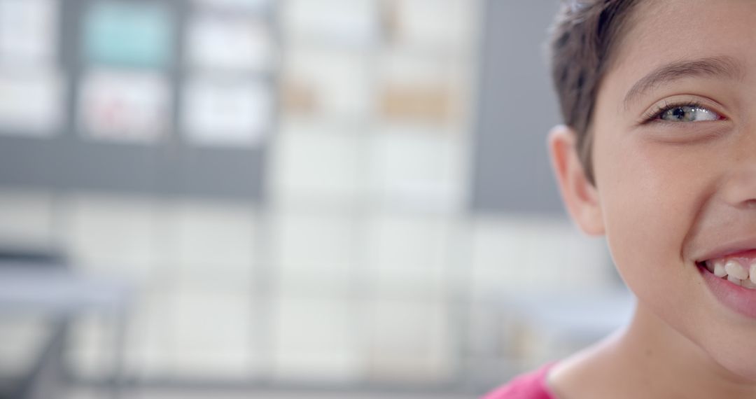 Smiling Schoolboy in Classroom Celebrating Education