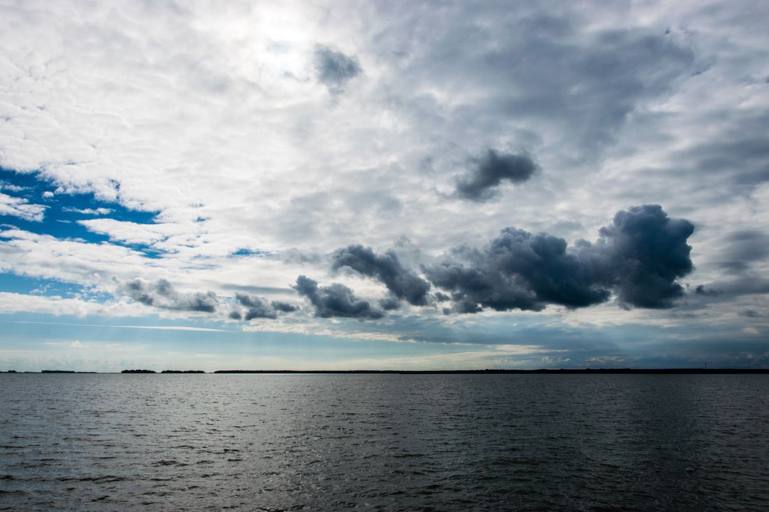 Dramatic Sky Over Serene Ocean - Free Images, Stock Photos and Pictures on Pikwizard.com