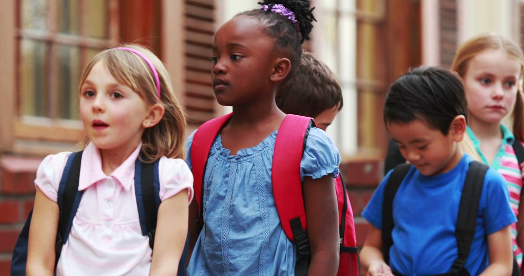 Diverse Group of Children with Backpacks on School Field Trip