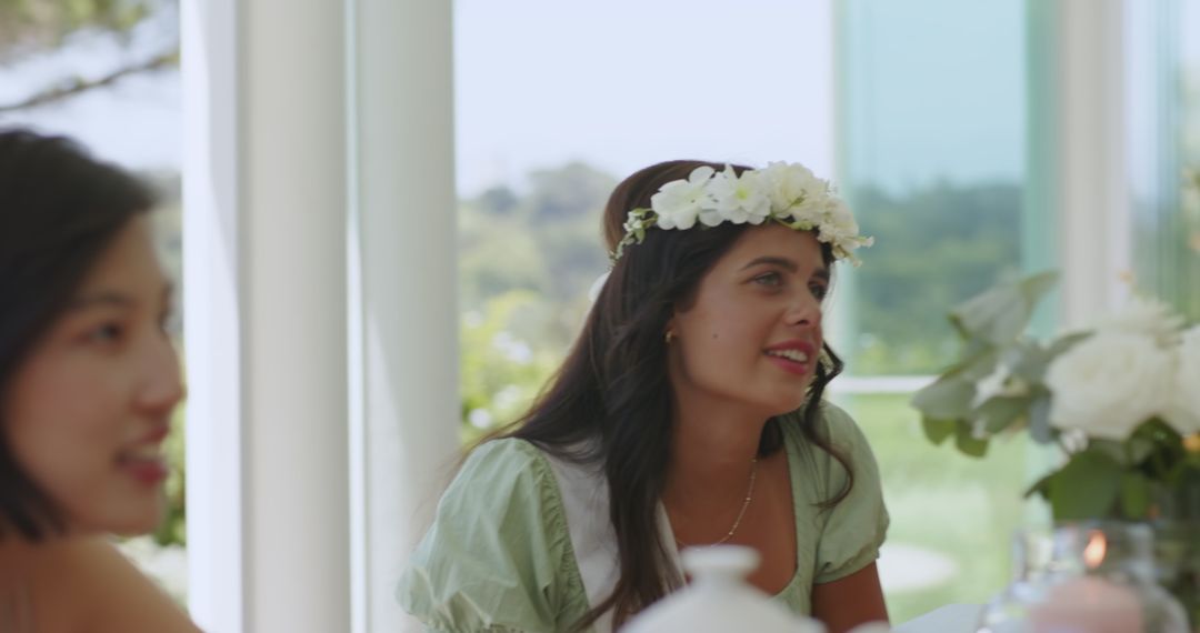 Joyful Gathering at Wedding Reception with Floral Decor