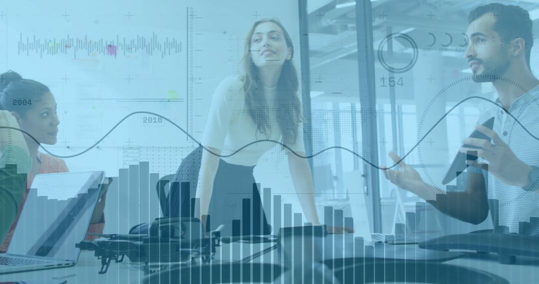 Collaborative Team Meeting Amid Financial Data Graphics