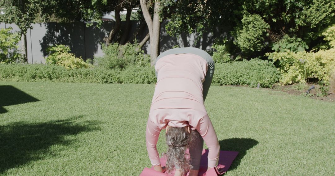 Woman Practicing Yoga in Backyard on Sunny Day - Free Images, Stock Photos and Pictures on Pikwizard.com