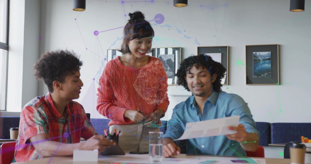 Professionals Collaborating with Technology at Office Table