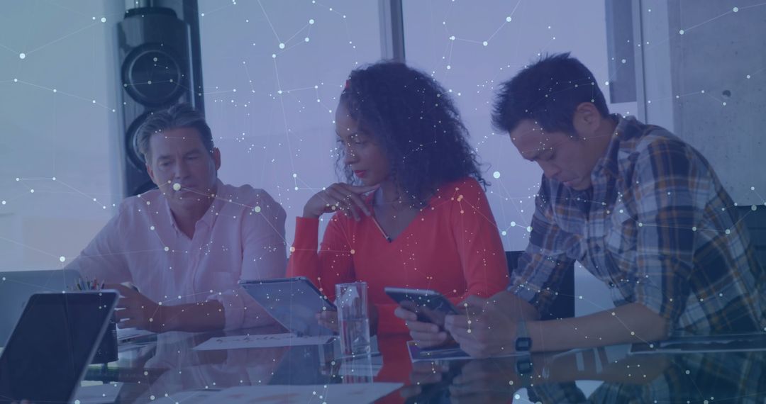 Diverse Team Analyzing Data Graphs in Modern Office Setting