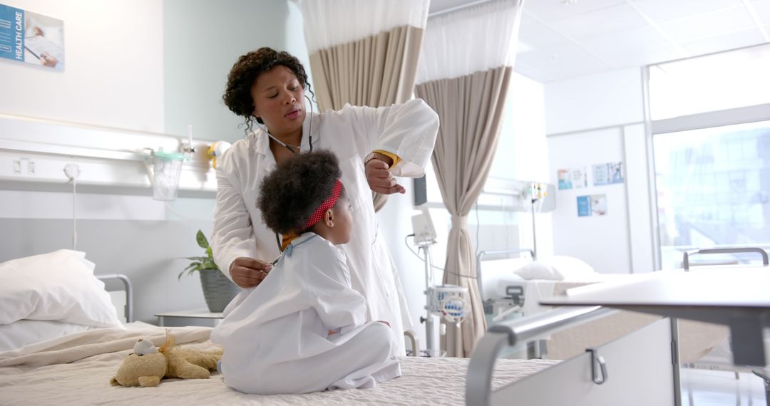 Female Doctor Examining Child Patient in Hospital Room - Free Images, Stock Photos and Pictures on Pikwizard.com