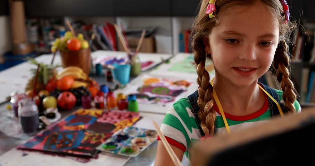 Young Girl Painting in Vibrant Art Studio - Free Images, Stock Photos and Pictures on Pikwizard.com