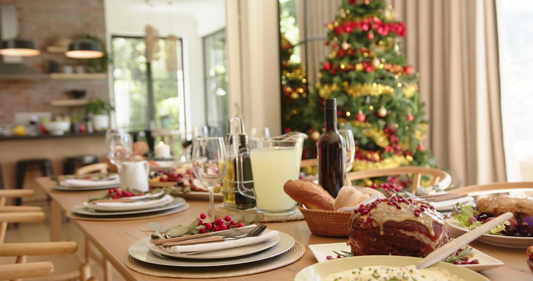 Festive Christmas Dining Table and Tree Celebration - Free Images, Stock Photos and Pictures on Pikwizard.com