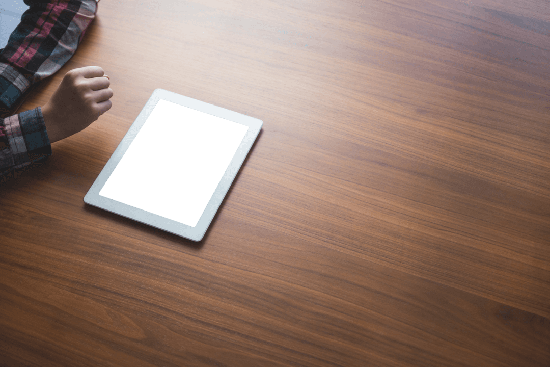 Transparent Digital Tablet on Wooden Desk with User Interface