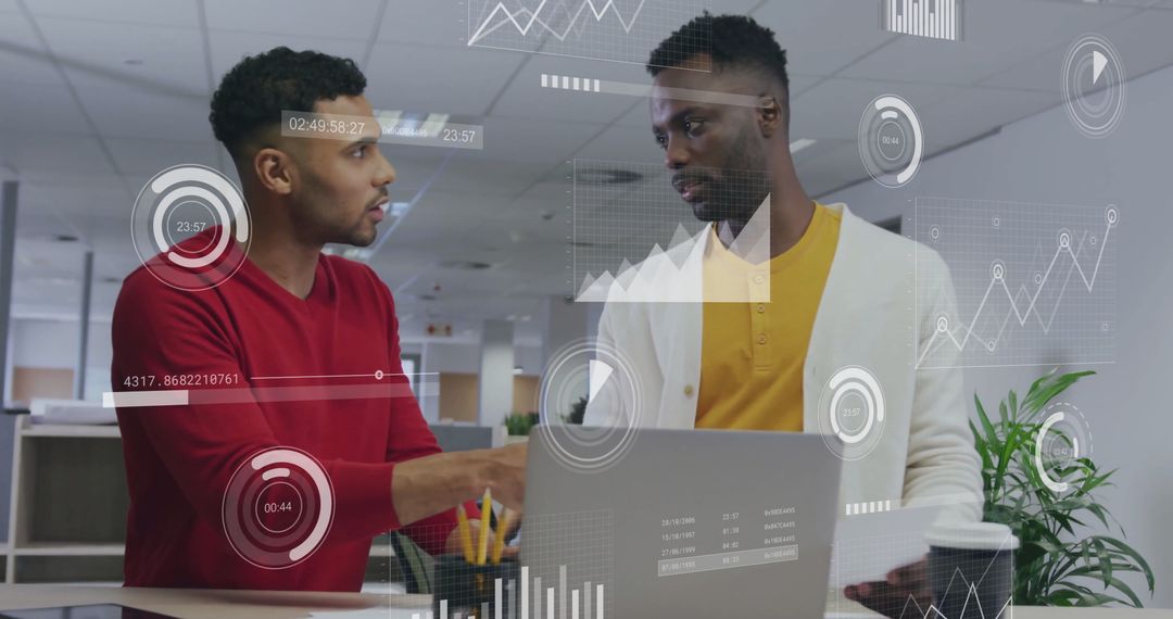 Diverse Professionals Discussing Digital Data in Modern Office