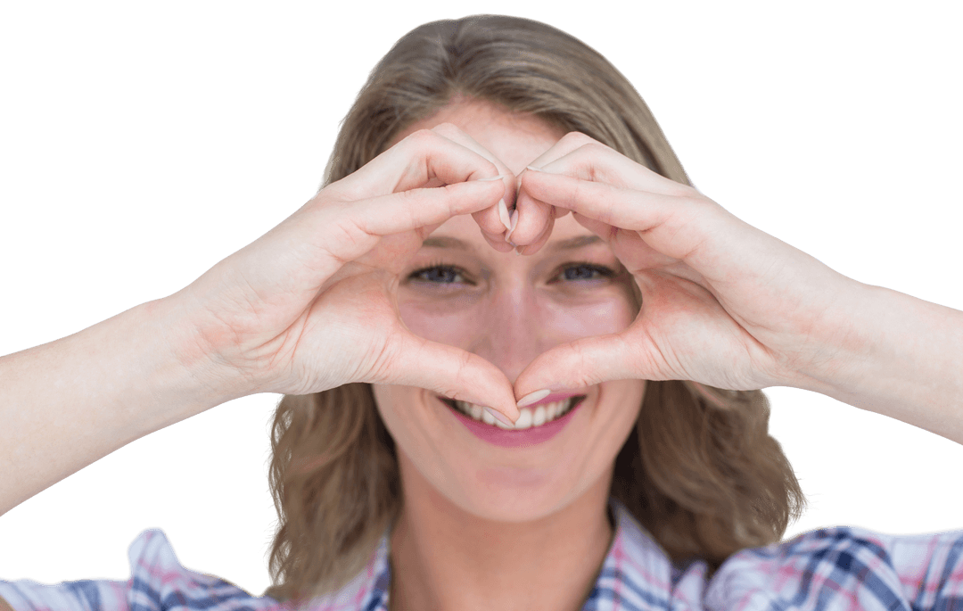Smiling Woman Using Hands to Create Transparent Heart Gesture
