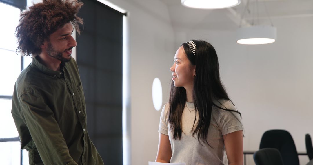 Diverse Colleagues Cooperating in Modern Office Environment