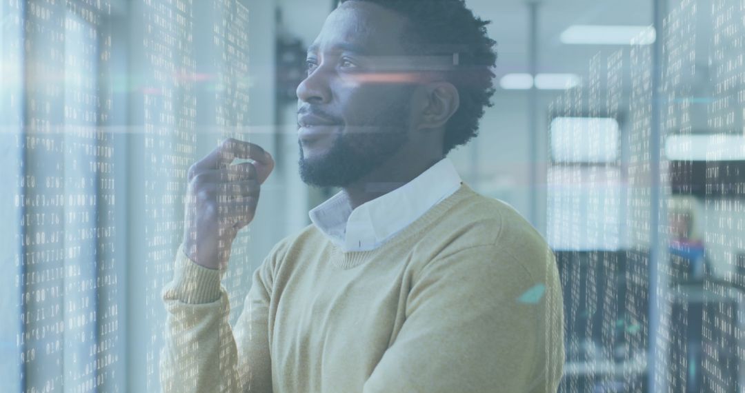 Contemplative Businessman Analyzing Digital Data in Office