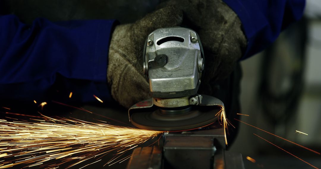 Welder Grinding Metal with Electric Tool in Workshop - Free Images, Stock Photos and Pictures on Pikwizard.com