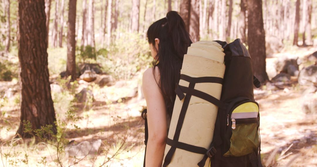 Woman Hiking in Forest with Camping Gear - Free Images, Stock Photos and Pictures on Pikwizard.com