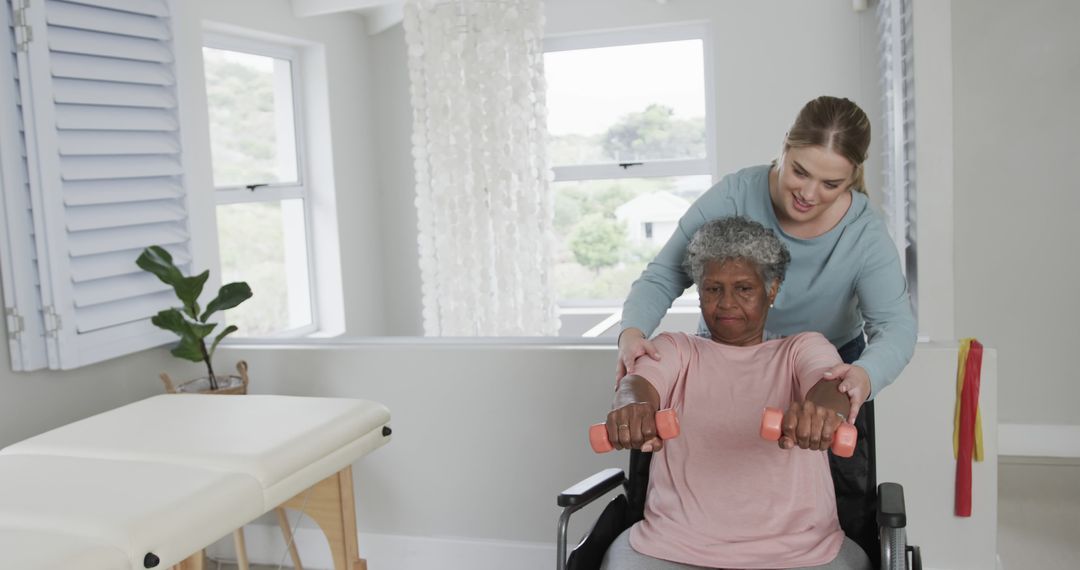 Physical Therapist Assisting Senior Woman with Exercise in Wheelchair - Free Images, Stock Photos and Pictures on Pikwizard.com