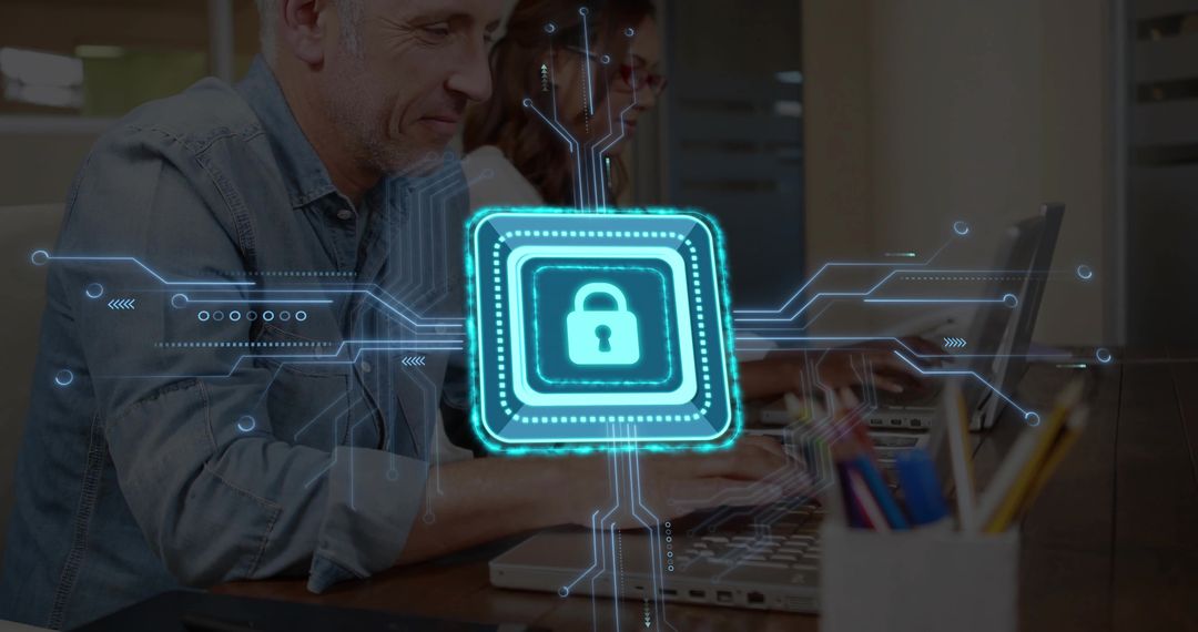 Coworking Team Securing Digital Data with Holographic Padlock Over Laptops in Modern Office