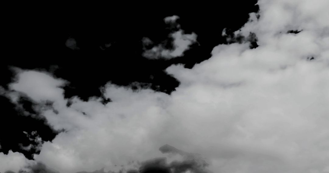 Dramatic Clouds Moving Against Dark Sky