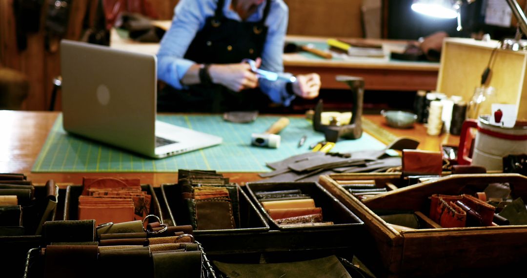 Close-up View of Artisan Handcrafting Leather Goods in Workshop - Free Images, Stock Photos and Pictures on Pikwizard.com