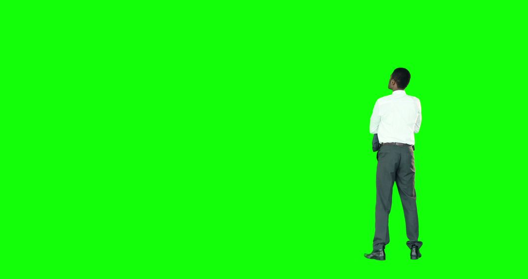 Professional Businessman on Green Background with Copy Space