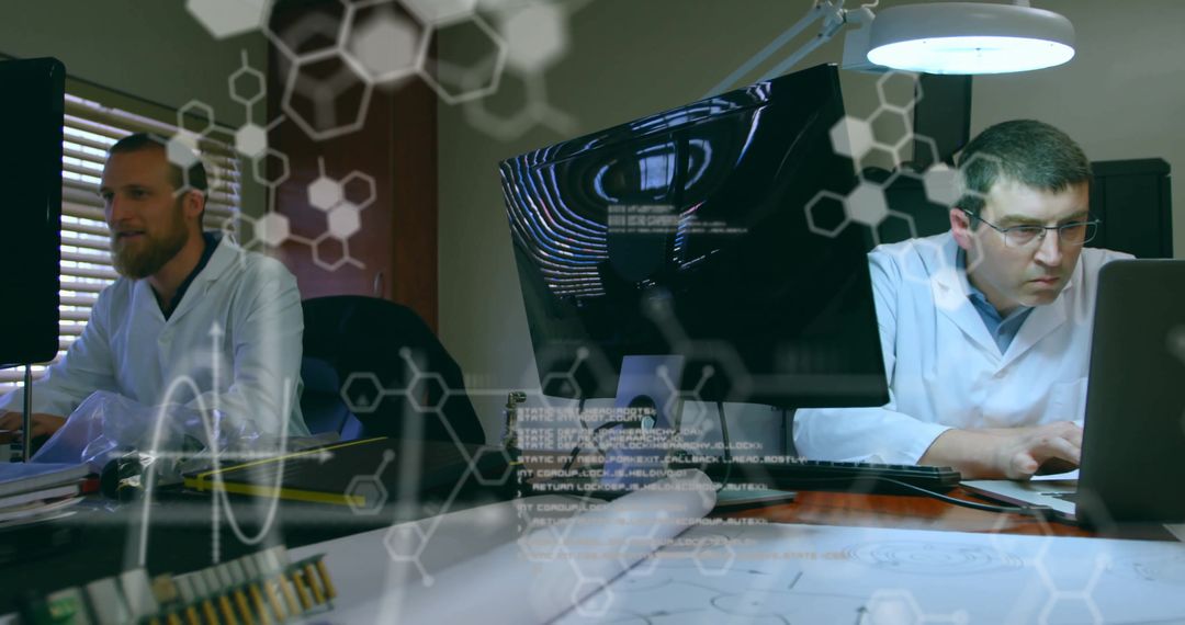 Scientists Analyzing Data in Technology Research Laboratory